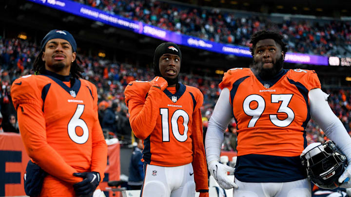 DENVER, CO - OCTOBER 29: Denver Broncos safety P.J. Locke (6), wide receiver Jerry Jeudy (10), and Denver Broncos defensive tackle D.J. Jones (93) look on as time expires during a game between the Kansas City Chiefs and the Denver Broncos at Empower Field at Mile High on October 29, 2023 in Denver, Colorado.