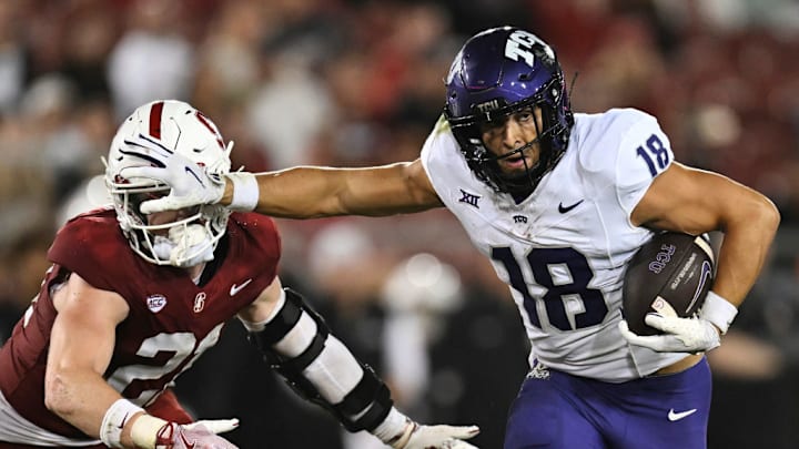 STANFORD, CALIFORNIA - AUGUST 30: Jack Bech #18 of the TCU Horned Frogs holds off Scotty Edwards #21 of the Stanford Cardinal in the third quarter at Stanford Stadium on August 30, 2024 in Stanford, California. STANFORD, CALIFORNIA - AUGUST 30: Jack Bech #18 of the TCU Horned Frogs holds off Scotty Edwards #21 of the Stanford Cardinal in the third quarter at Stanford Stadium on August 30, 2024 in Stanford, California.