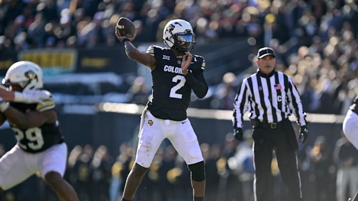 BOULDER, CO - NOVEMBER 29: Shedeur Sanders #2 of the Colorado Buffaloes looks to pass against the Oklahoma State Cowboys in the third quarter at Folsom Field on November 29, 2024 in Boulder, Colorado. v