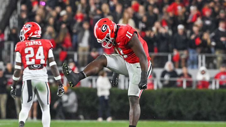 ATHENS, GA - NOVEMBER 16: Georgia Bulldogs linebacker Jalon Walker (11) celebrates a big hit during the college football game between the Tennessee Volunteers and the Georgia Bulldogs on November 16, 2024, on Dooley Field at Sanford Stadium in Athens, GA.
