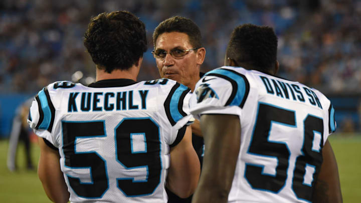 CHARLOTTE, NC - AUGUST 09: Carolina Panthers head coach Ron Rivera talks with Carolina Panthers middle linebacker Luke Kuechly (59) and Carolina Panthers outside linebacker Thomas Davis (58) during the preseason game between the Houston Texans and the Carolina Panthers on August 9, 2017 at Bank of America Stadium in Charlotte, NC. 