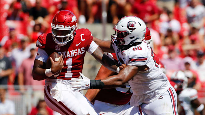 FAYETTEVILLE, AR - SEPTEMBER 10: Arkansas Razorbacks quarterback KJ Jefferson (1) attempts to avoid being sacked by South Carolina Gamecocks defensive lineman T.J. Sanders (90) during the college football game between the South Carolina Gamecocks and Arkansas Razorbacks on September 10, 2022, at Donald W. Reynolds Razorback Stadium in Fayetteville, Arkansas.