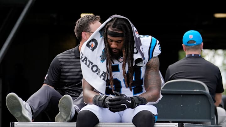 CHARLOTTE, NORTH CAROLINA - SEPTEMBER 29: Shaq Thompson #54 of the Carolina Panthers is carted off the field after being injured in the fourth quarter against the Cincinnati Bengals at Bank of America Stadium on September 29, 2024 in Charlotte, North Carolina.