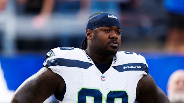 INGLEWOOD, CALIFORNIA - JANUARY 5: Jarran Reed #90 of the Seattle Seahawks on the sideline during the fist half against the Los Angeles Rams at SoFi Stadium on January 5, 2025 in Inglewood, California.
