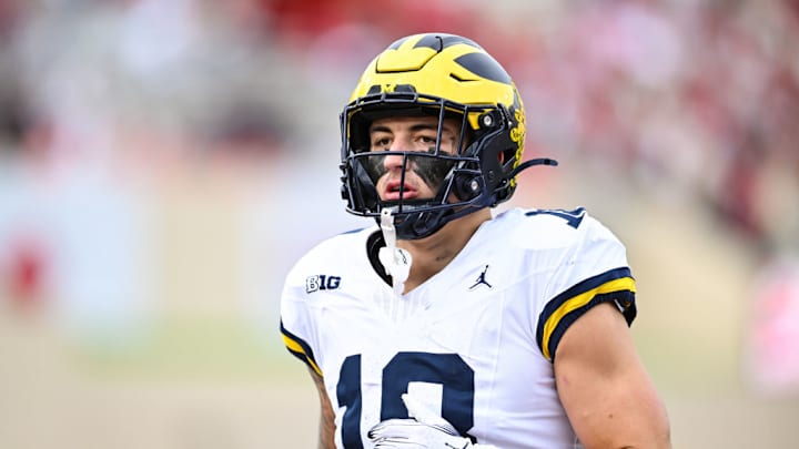 BLOOMINGTON, IN - NOVEMBER 09: Michigan Wolverines TE Colston Loveland (18) warms up prior to a college football game between the Michigan Wolverines and Indiana Hoosiers on November 9, 2024 at Memorial Stadium in Bloomington, IN