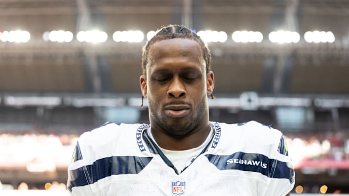 GLENDALE, ARIZONA - DECEMBER 8: Geno Smith #7 of the Seattle Seahawks looks on during the national anthem prior to an NFL Football game against the Arizona Cardinals at State Farm Stadium on December 08, 2024 in Glendale, Arizona. 