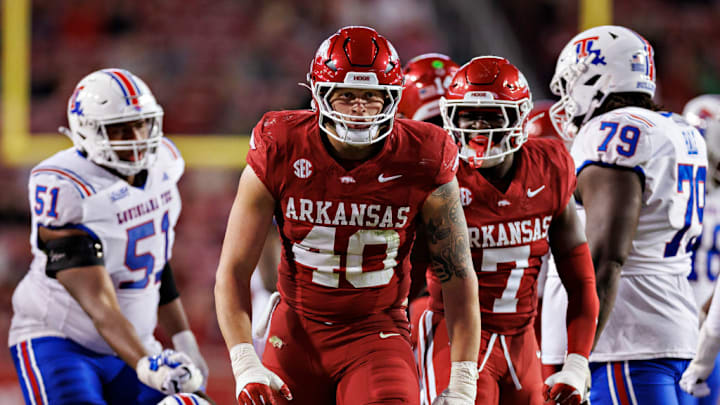 FAYETTEVILLE, ARKANSAS - NOVEMBER 23: Landon Jackson #40 of the Arkansas Razorbacks celebrates after making a big tackle during a game against the Louisiana Tech Bulldogs at Donald W. Reynolds Razorback Stadium on November 23, 2024 in Fayetteville, Arkansas. The Razorbacks defeated the Bulldogs 35-14. FAYETTEVILLE, ARKANSAS - NOVEMBER 23: Landon Jackson #40 of the Arkansas Razorbacks celebrates after making a big tackle during a game against the Louisiana Tech Bulldogs at Donald W. Reynolds Razorback Stadium on November 23, 2024 in Fayetteville, Arkansas. The Razorbacks defeated the Bulldogs 35-14.