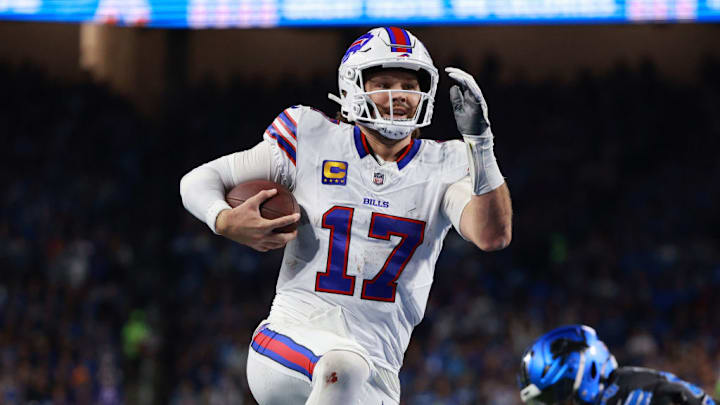 DETROIT,MICHIGAN-December 15: Buffalo Bills quarterback Josh Allen #17 carries the ball for a touchdown during the first half of an NFL football game between the Buffalo Bills and the Detroit Lions at Ford Field in Detroit, Michigan USA, on Sunday, December 15, 2024.