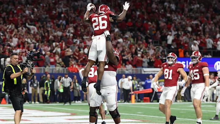 Alabama running back Jam Miller (26) celebrates against Georgia at Mercedes-Benz Stadium in Atlanta, GA on Saturday, Dec 2, 2023.