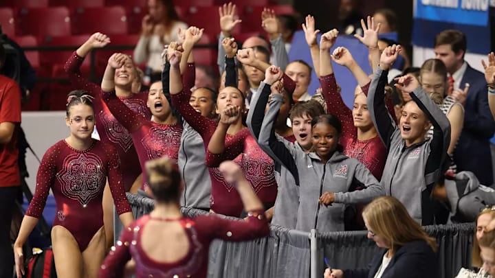 The Alabama gymnastics team celebrates.