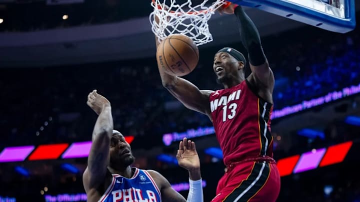 The Miami Heat's Bam Adebayo (13) dunking over the Philadelphia 76ers' Paul Reed (left). The Miami Heat's Bam Adebayo (13) dunking over the Philadelphia 76ers' Paul Reed (left).