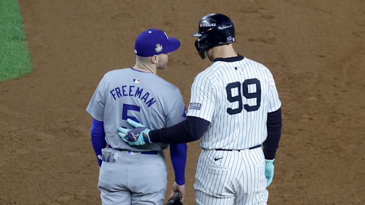 Freeman and Judge greet each other at first base during the '24 World Series