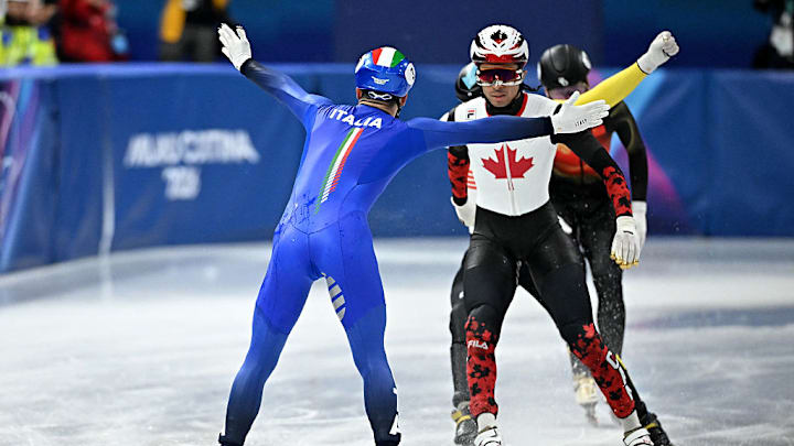 Pietro Sighel of Team Italy had an all-time great celebration after winning gold in the short track speed skating mixed team relay event at the 2026 Milan Cortina Olympics.
