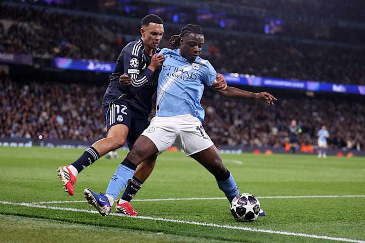 特伦特·亚历山大-阿诺德，杰雷米·多库