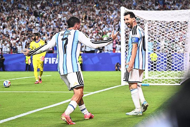 Messi smiling at De Paul Messi smiling at De Paul