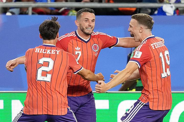 John McGinn celebrates