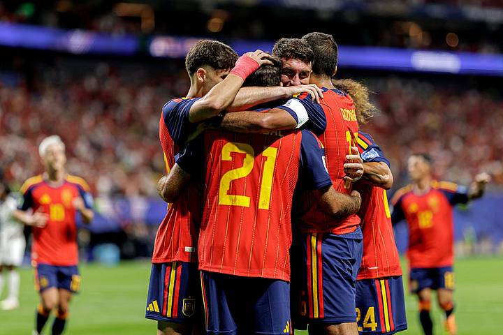 Spain players celebrate.