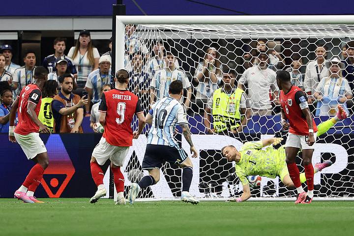Lionel Messi scores against Austria.
