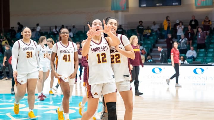Minnesota celebrating its win over South Florida at the Baha Mar Hoops event in the Bahamas.