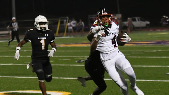 Alexandria Senior High defender Kerrick Gaines (8) wraps up West Monroe’s Trez Davis (4) in a district game held Friday, Oct. 11, 2024 at Butch Stoker Memorial Stadium in Alexandria. Simon Kartez (1) comes in to assist. ASH won 45-35 and is 6-0 on the season.