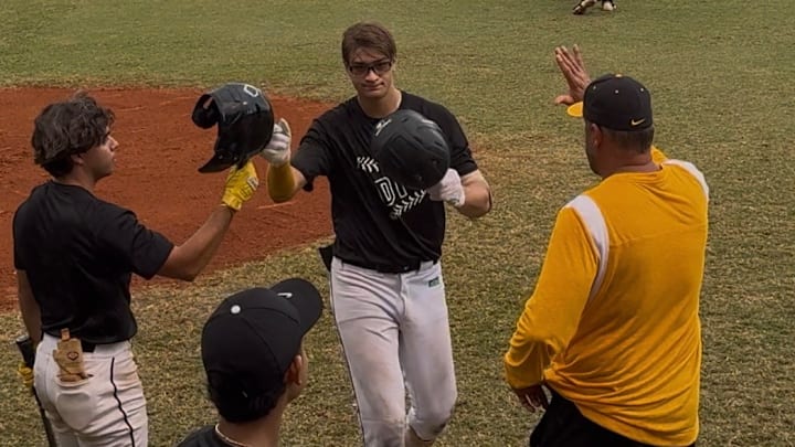 American Heritage's Dylan Dubovik is congratulated after hitting a home run. Dubovik has signed with the University of Miami.