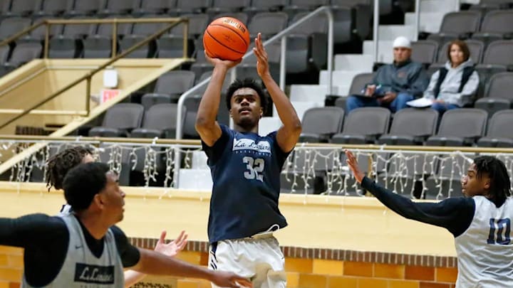 La Lumiere's Jalen Haralson (32) puts up a shot during an open practice Thursday, Nov. 9, 2023, at the La Porte Civic Auditorium.