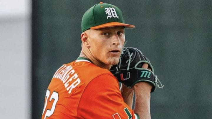 Pitcher Rafe Schlesinger preparing to throw a strike
