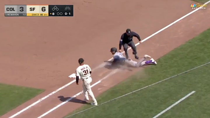 Chris Guccione did a great job of avoiding what could have been a very painful collision in Saturday's Rockies-Giants game. 