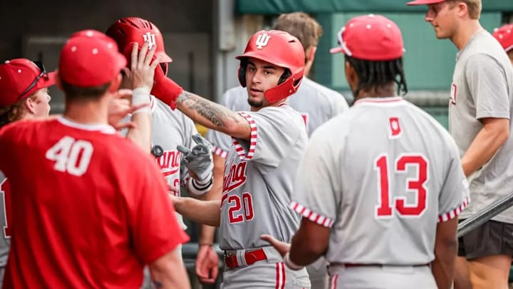 Indiana slugger Korbyn Dickerson is congratulated in the dugout during the Hoosiers' weekend series against Abilene Christian.
