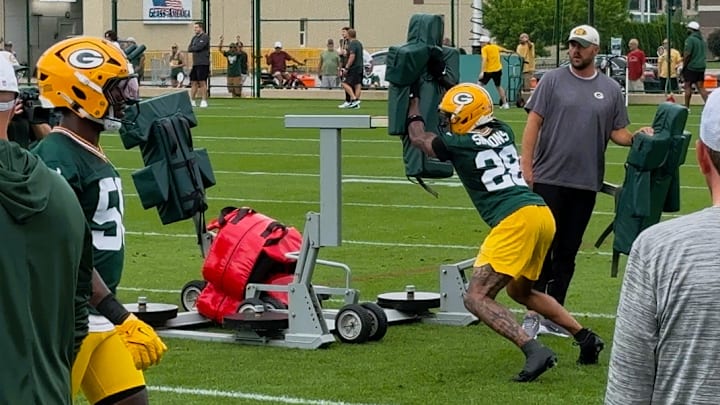 Packers linebacker Isaiah Simmons goes through drills at training camp. Packers linebacker Isaiah Simmons goes through drills at training camp.