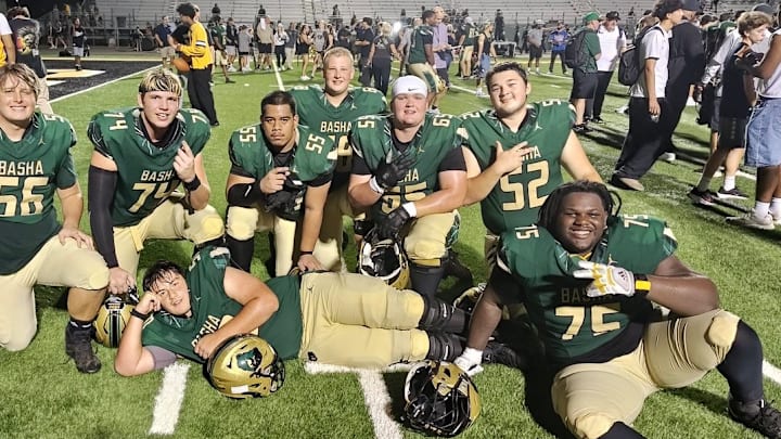 Dajohn Yarborough, right, is a 6-foot-6, 340-pound UW recruit. 