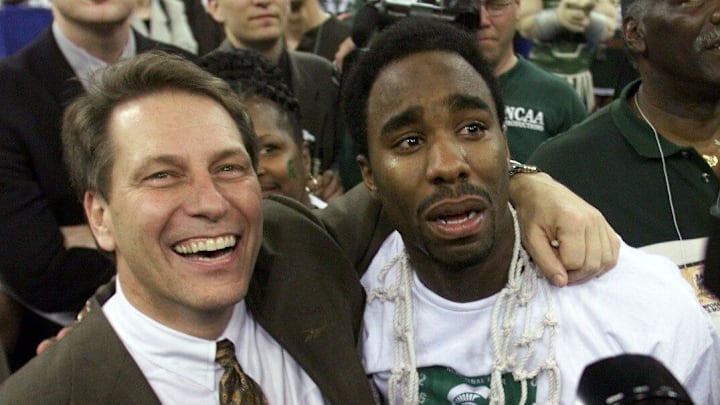 A tearful Mateen Cleaves celebrates with Tom Izzo after Michigan State defeated Florida to win the NCAA championship in 2000.