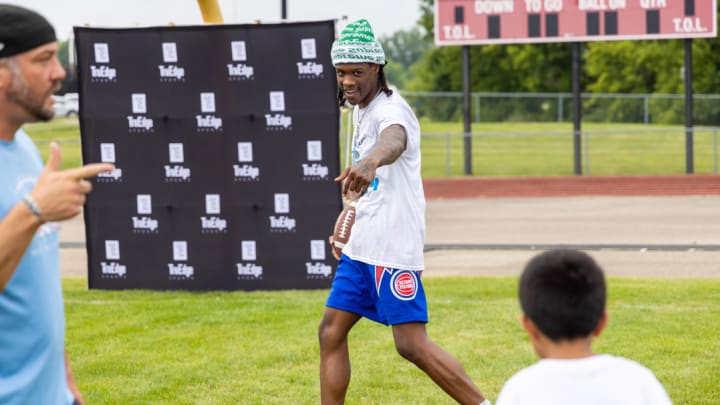 Detroit Lions wide receiver Jameson Williams at Youth Football Camp 