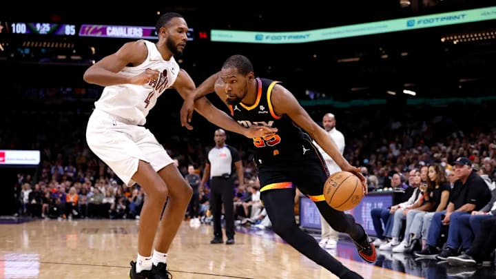 Kevin Durant drives against Evan Mobley during the Phoenix Suns' game against the Cleveland Cavaliers. Kevin Durant drives against Evan Mobley during the Phoenix Suns' game against the Cleveland Cavaliers.