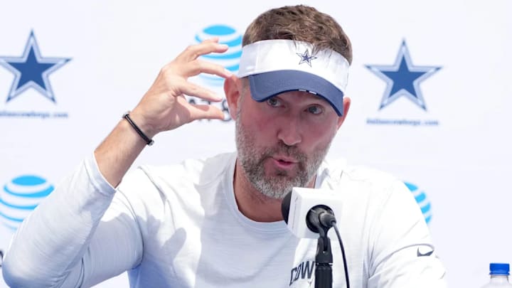 Dallas Cowboys coach Brian Schottenheimer at training camp press conference at the River Ridge Fields. Dallas Cowboys coach Brian Schottenheimer at training camp press conference at the River Ridge Fields.