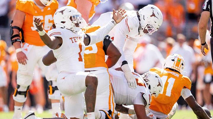 Sep 26, 2026; Knoxville, Tennessee, USA; Texas edge Colin Simmons (1) celebrates after Tennessee quarterback Faizon Brandon (11) is sacked again during a college football game between Tennessee and Texas at Neyland Stadium in Knoxville, Tenn. on Sept. 26, 2026. Sep 26, 2026; Knoxville, Tennessee, USA; Texas edge Colin Simmons (1) celebrates after Tennessee quarterback Faizon Brandon (11) is sacked again during a college football game between Tennessee and Texas at Neyland Stadium in Knoxville, Tenn. on Sept. 26, 2026.