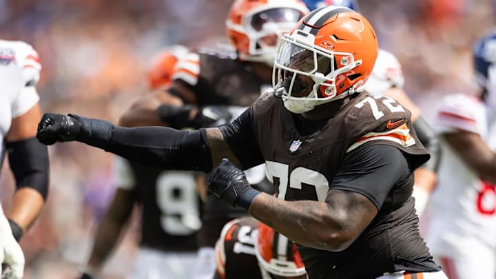 Sep 22, 2024; Cleveland, Ohio, USA; Cleveland Browns defensive tackle Quinton Jefferson (72) celebrates his tackle for a loss of yardage against the New York Giants during the second quarter at Huntington Bank Field. Mandatory Credit: Scott Galvin-Imagn Images Sep 22, 2024; Cleveland, Ohio, USA; Cleveland Browns defensive tackle Quinton Jefferson (72) celebrates his tackle for a loss of yardage against the New York Giants during the second quarter at Huntington Bank Field. Mandatory Credit: Scott Galvin-Imagn Images
