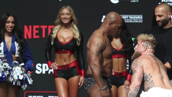 Jake Paul and Mike Tyson face off during weigh-ins at the Toyota Music Factory. Jake Paul and Mike Tyson face off during weigh-ins at the Toyota Music Factory.