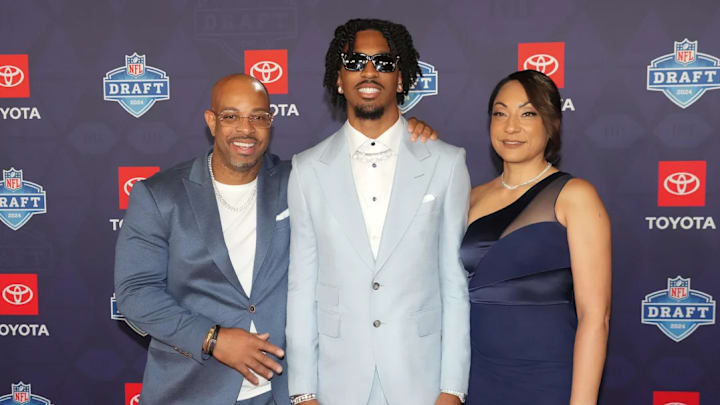 Jayden Daniels stands on the red carpet ahead of the 2024 NFL Draft. 