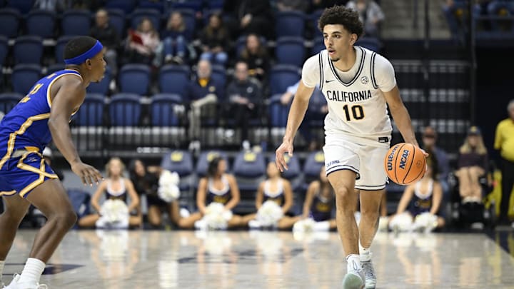 Justin Pippen (10) brings the ball up court for Cal