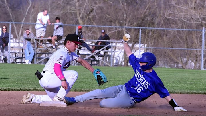 Horseheads' Trevor Reidy is safe at second with a double as Elmira shortstop Ben Rhode applies the tag during the Blue Raiders' 10-5 win in 2024.