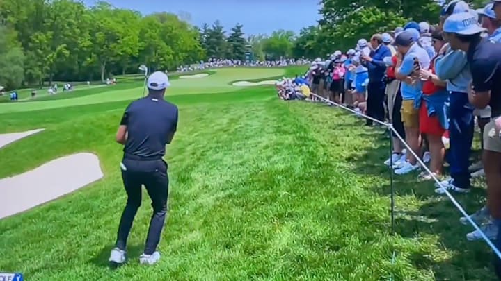 Jordan Spieth made par on the first hole after nearly hitting a fan with his second shot.