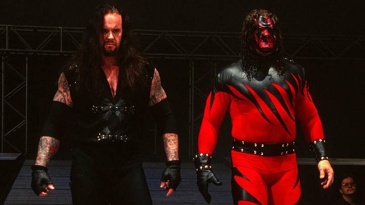 Undertaker (Left) and Kane (Right) walking down the ramp