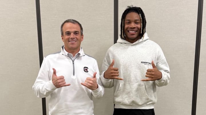 Coach Shane Beamer with Wr, Ryan Mosely Coach Shane Beamer with Wr, Ryan Mosely