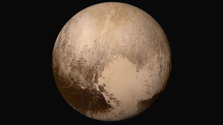 NASA’s iconic image of Pluto, showing its heart-like pattern, captured by the New Horizons flyby in 2015.