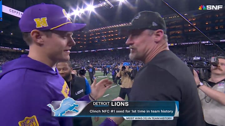 Kevin O'Connell and Dan Campbell greet on the field after the Detroit Lions defeat the Minnesota Vikings in Week 18.