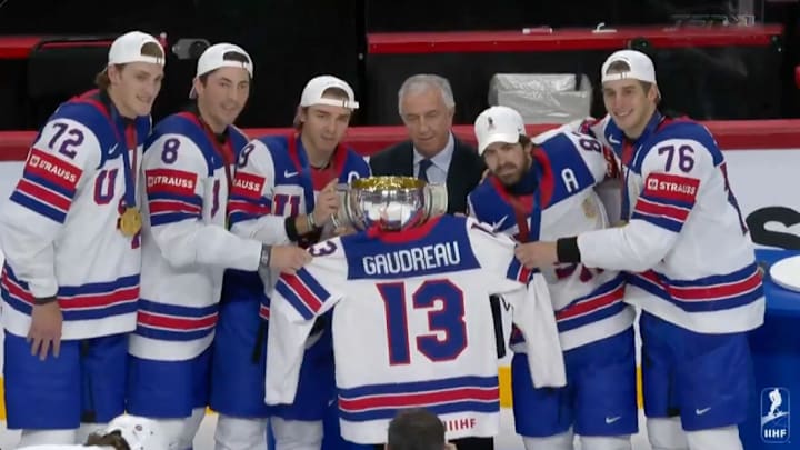 Team USA honors Johnny Gaudreau while celebrating winning gold at the 2025 IIHF World Championships.