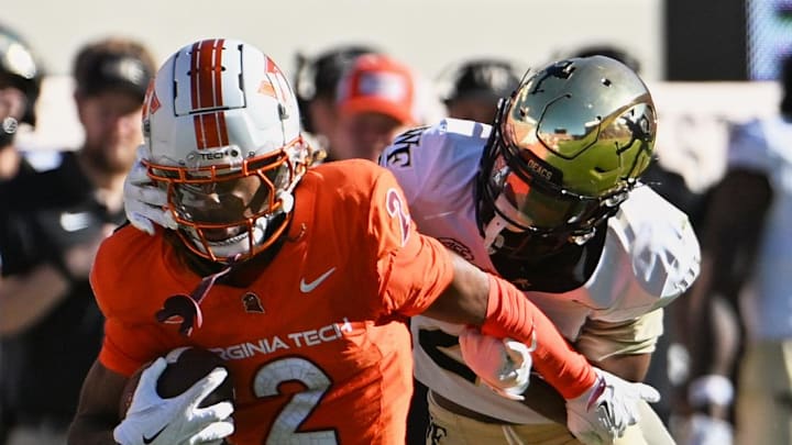 Oct 4, 2025; Blacksburg, Virginia, USA;  Wake Forest Demon Deacons free safety Braylon Johnson (23) tackles Virginia Tech Hokies wide receiver Takye Heath (2) after a catch during the fourth quarter Lane Stadium. Mandatory Credit: Brian Bishop-Imagn Images