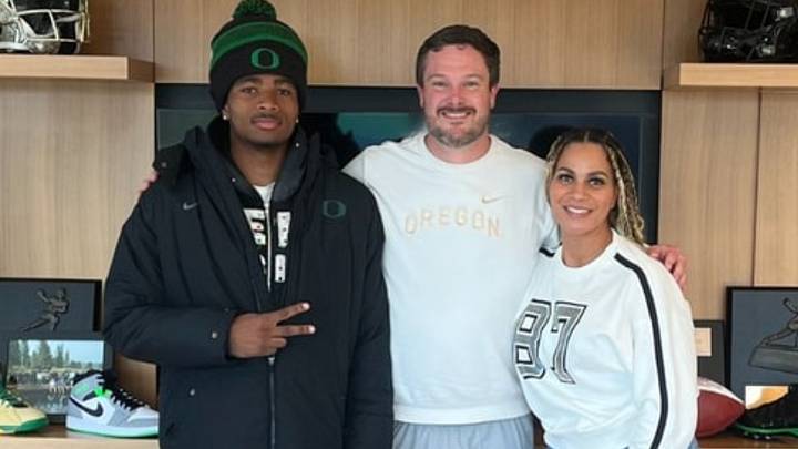 Oregon Ducks coach Dan Lanning with Messiah Hampton and his mom Oregon Ducks coach Dan Lanning with Messiah Hampton and his mom