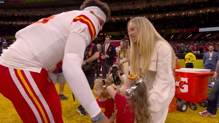 Patrick Mahomes and his family on the field ahead of Super Bowl LIX. 